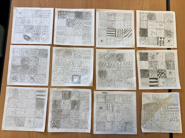 We have been exploring mark making techniques to create interest and texture.